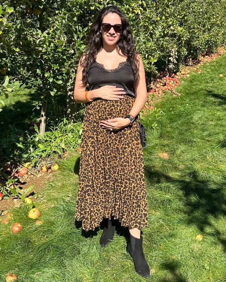 Fall outfit that’s bump friendly. Leopard print elastic exist pleated skirt, lace black cami top, black booties. I had a leather jacket layered on top when it got cooler at night. A great casual outfit for a day date pumpkin and apple picking. 

#LTKSeasonal #LTKbump #LTKfindsunder50