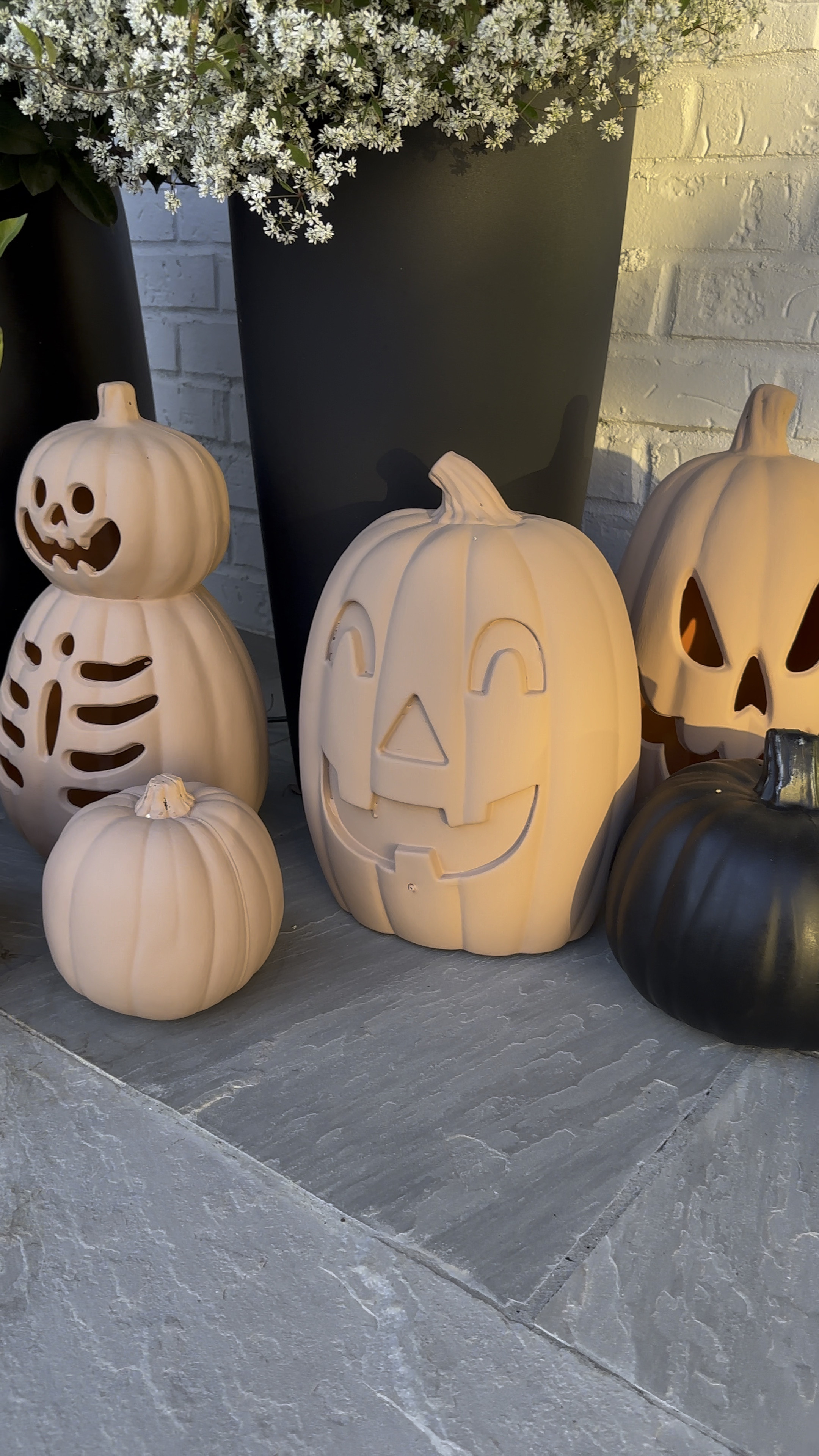 Uniform monochromatic porch pumpkin decor. I just painted them to have a terracotta color and fit the aesthetic better  

#LTKHalloween #LTKSeasonal