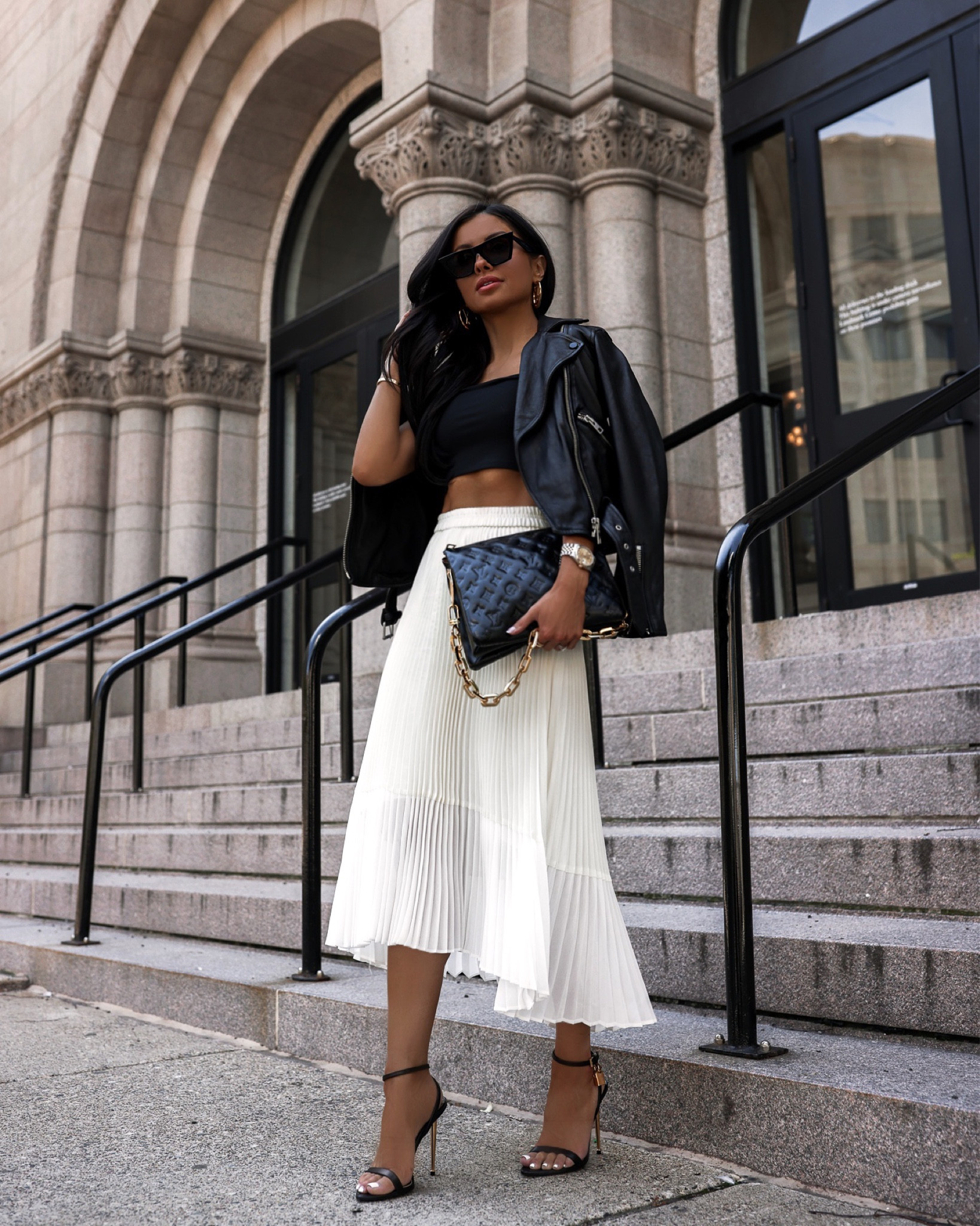Summer skirt outfit / date night outfit 
White pleated skirt 
Black tube top
Leather jacket


#LTKunder100 #LTKstyletip #LTKitbag