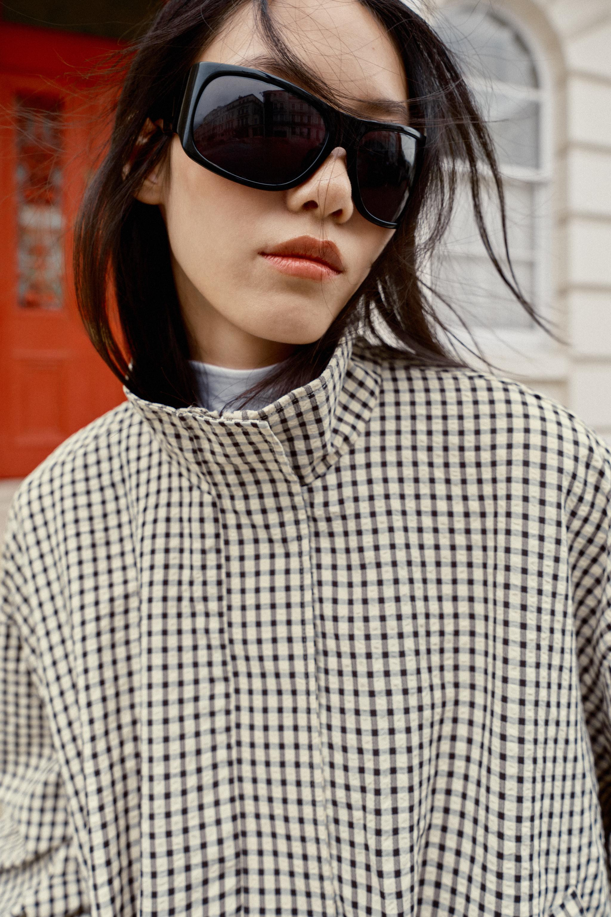 High collar bomber jacket with long sleeves. Front welt pockets. Voluminous hem with front pleats... | Zara US