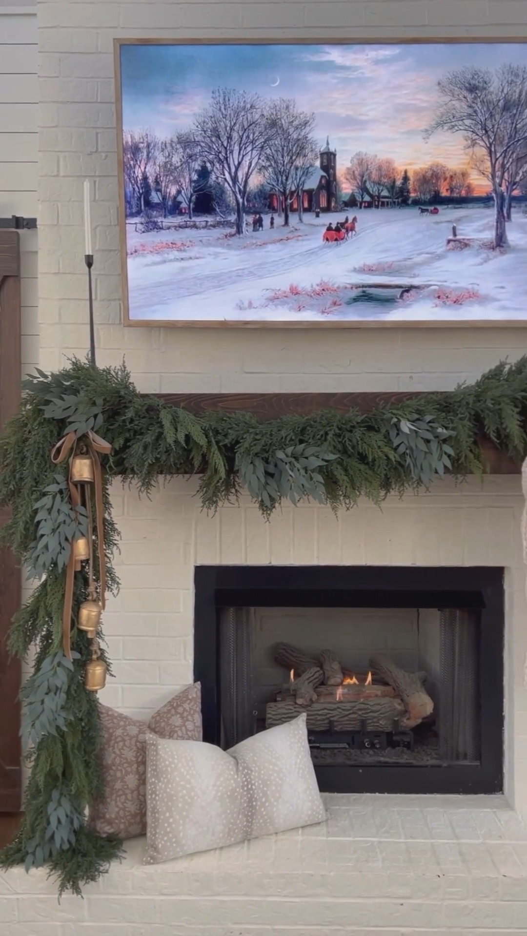 My Christmas mantle three years ago was a fave! I loved mixing cedar and eucalyptus to get this dark green layered look that was still simple and the perfect backdrop for gold bells and white stockings! These cedar garland is still my favorite to use year after year!

#LTKSeasonal #LTKHoliday #LTKHome