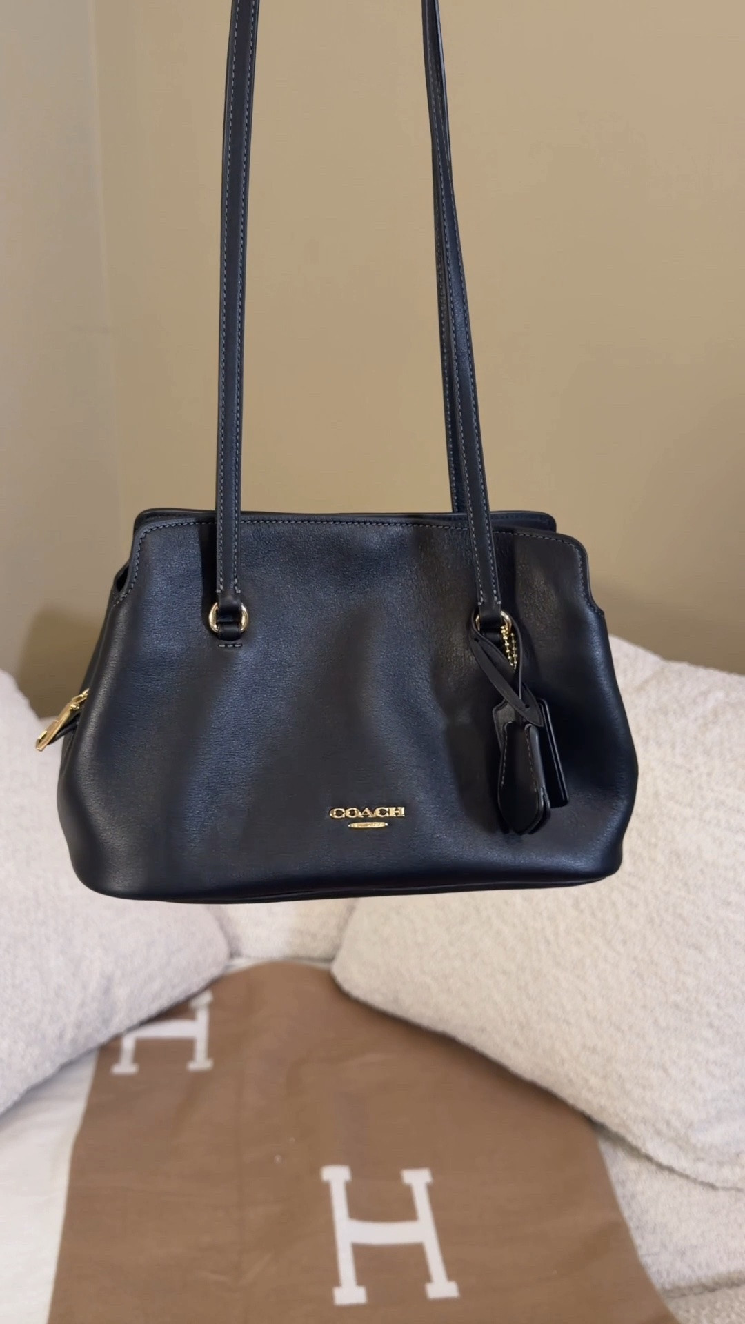 The new girl in town 👀 Comment SHOP & I’ll dm you the link ♥️

I LOVE the new Coach Outlet Elisa, especially in black! She looks more expensive thank she is! I love her vintage style and shape and the multiple compartments in it. She reminds me of a smaller dressier Coach Erin and Rogue.