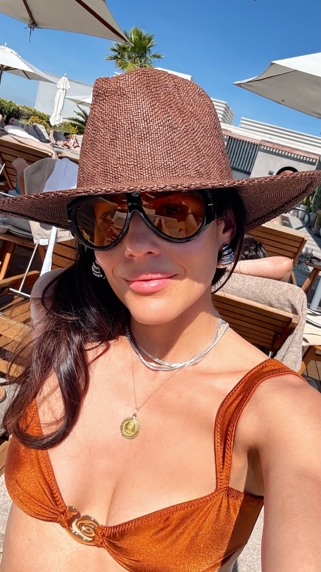 Golden hour ☀️ Found this straw hat on major sale and it’s the spring/summer essential—chic, lightweight, and gives the best sun coverage (we love a stylish SPF moment).

Wearing my favorite swimwear from last year—the gold details are everything and it has held up so beautifully. This burnt orange/coral shade is so flattering, but it also comes in other colors. Size up—runs small.

Effortless, timeless, and ready for every beach day or poolside moment 🤍

#LTKFestival #LTKootd #LTKTravel