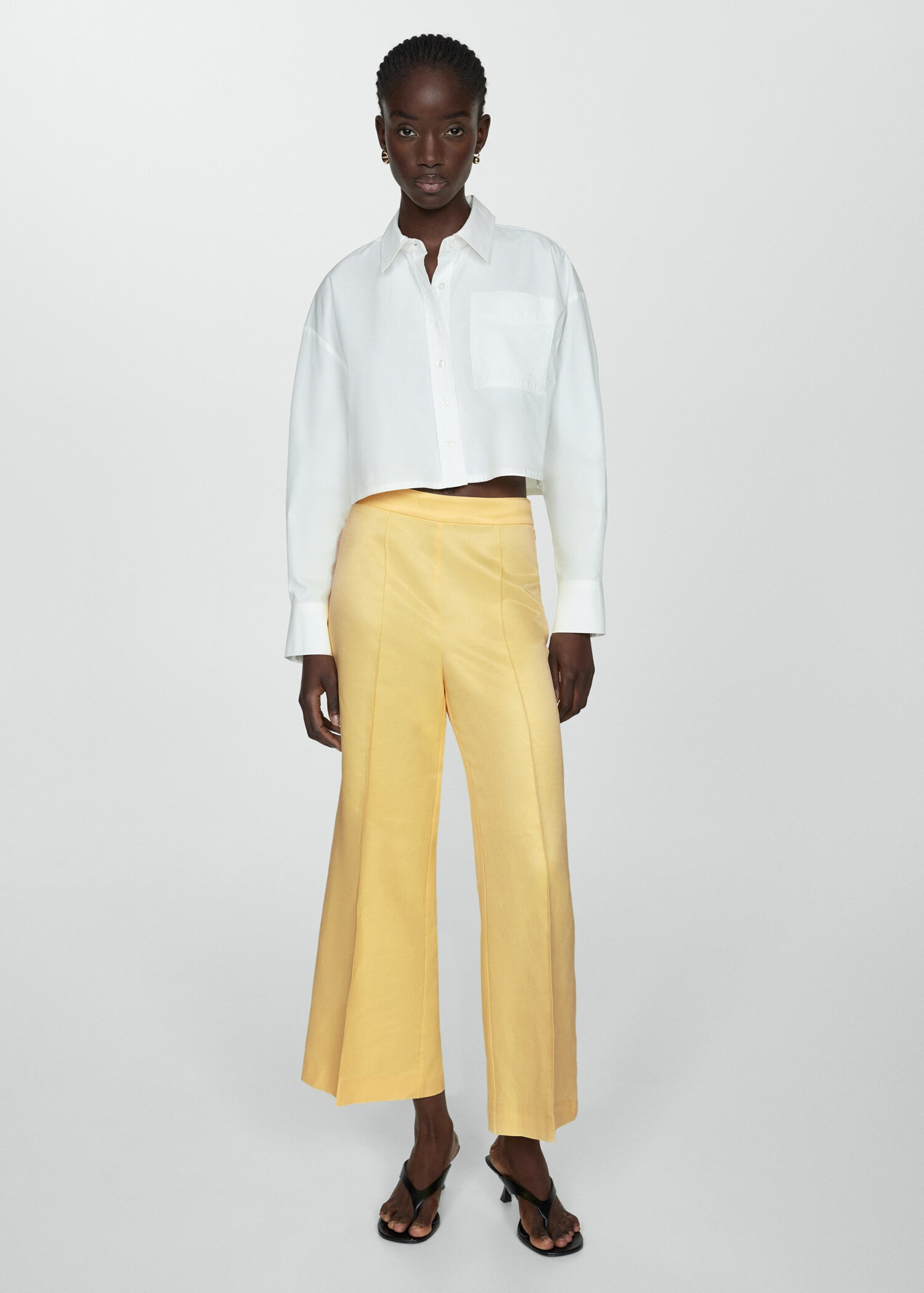 Flared trousers with pleated detail | MANGO (UK)