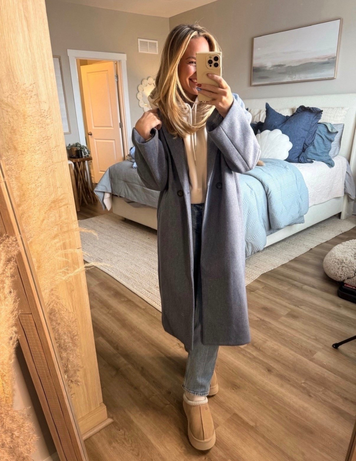 Low effort, high reward winter outfit. A neutral wool-style coat layered over a cozy hoodie with straight-leg jeans and classic slippers is my go-to for everyday style. Comfortable, polished, and easy to recreate for cold weather days.

winter outfit, neutral outfit, everyday outfit, casual chic, cozy layers, coat outfit, hoodie outfit, straight leg jeans, mom style, cold weather outfit, comfy outfit, casual winter style