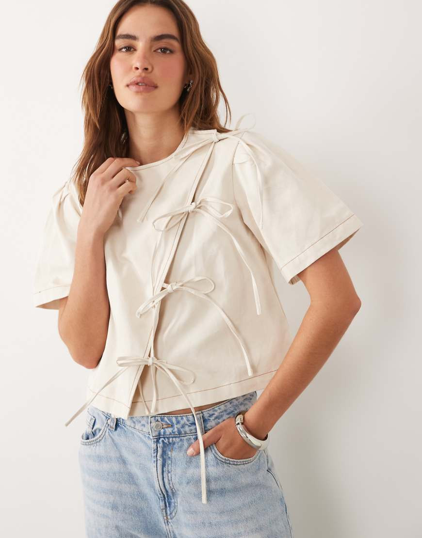 Ghospell cotton asymmetric bow detail boxy short sleeve boxy top in beige-Neutral | ASOS (Global)
