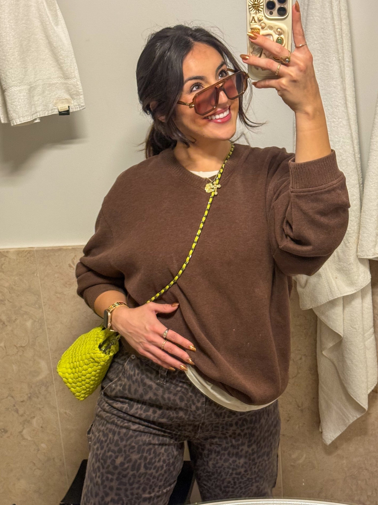 Brown and fun look with funky elements of leopard print, neon — Sweater is borrowed 

#LTKFindsUnder100 #LTKTravel #LTKMidsize