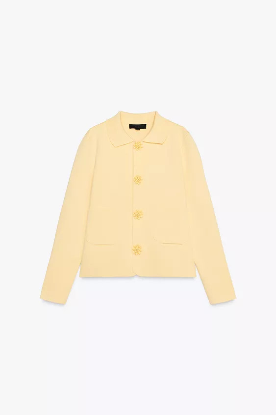 Lapel collar jacket with long sleeves. Front patch pockets. Front beaded button closure. | Zara US