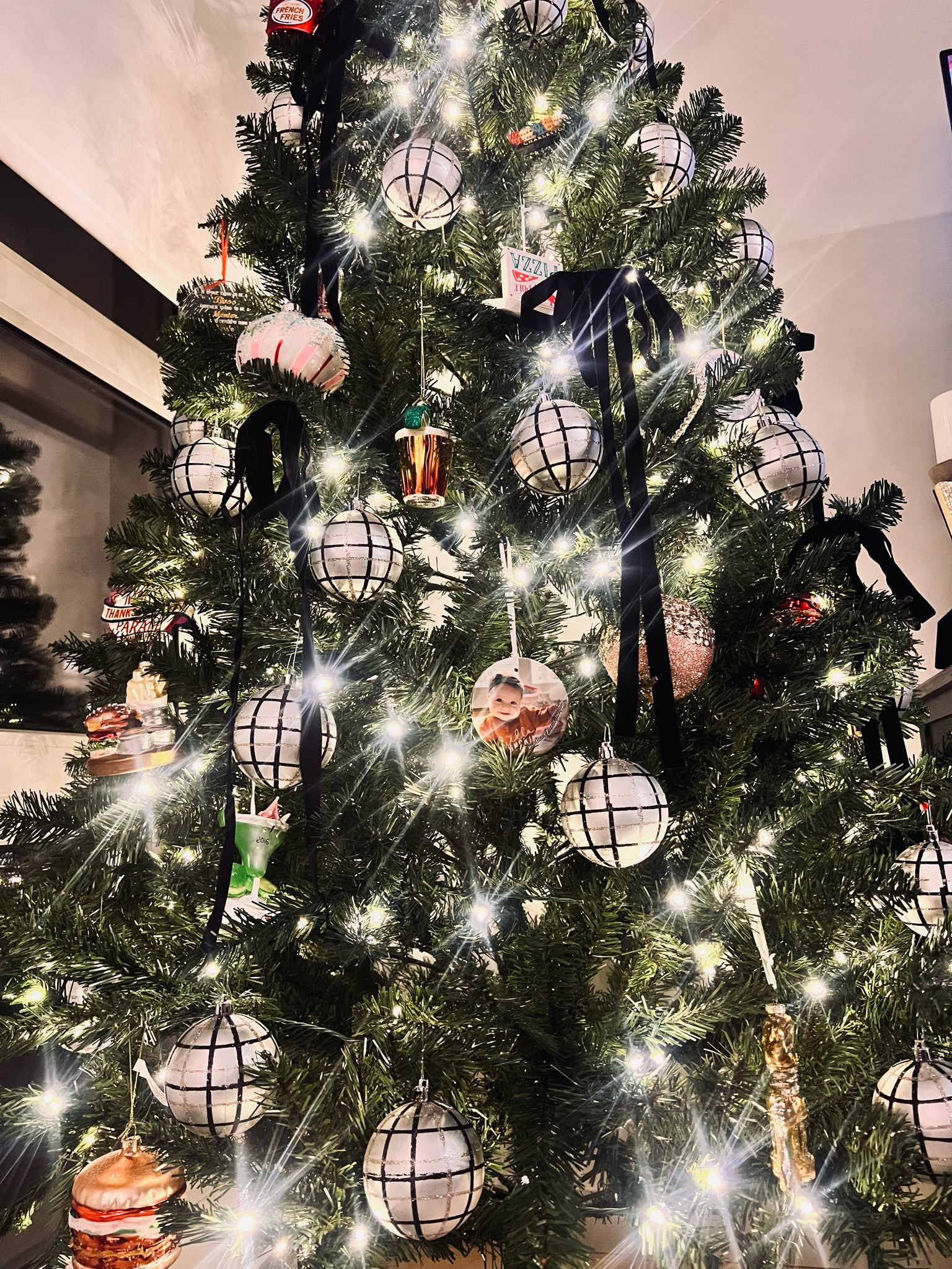 Finally time to get the house holiday cozy! Love these Martha Stewart ornaments I bought last year from Homegoods on sale (best time to shop is after Christmas), and couldn’t wait to use them this year! Black bows are from Target & come in packs of four; the perfect finish 🖤🎄

#LTKHome #LTKSaleAlert #LTKHoliday