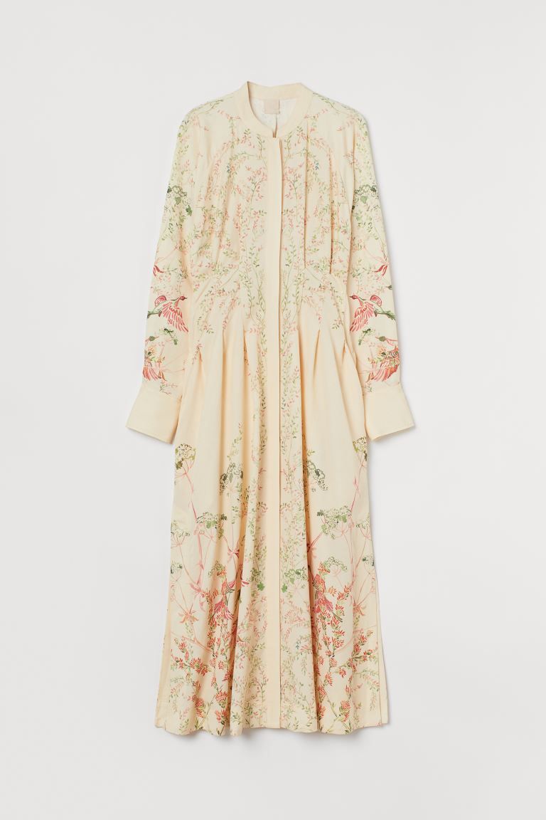 Long dress in an airy lyocell and linen weave with pleats and a defined waist. Small stand-up col... | H&M (UK, MY, IN, SG, PH, TW, HK)
