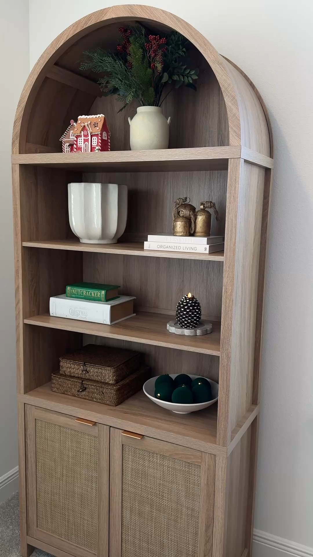 One of my favorite pieces decorated for Christmas! I have this bookshelf in my office where I need a lot of Holiday Magic since this is where I spend most of my day 🎄🎅🏼

#bookshelf #christmasdecor 

#LTKHoliday #LTKHome #LTKSeasonal