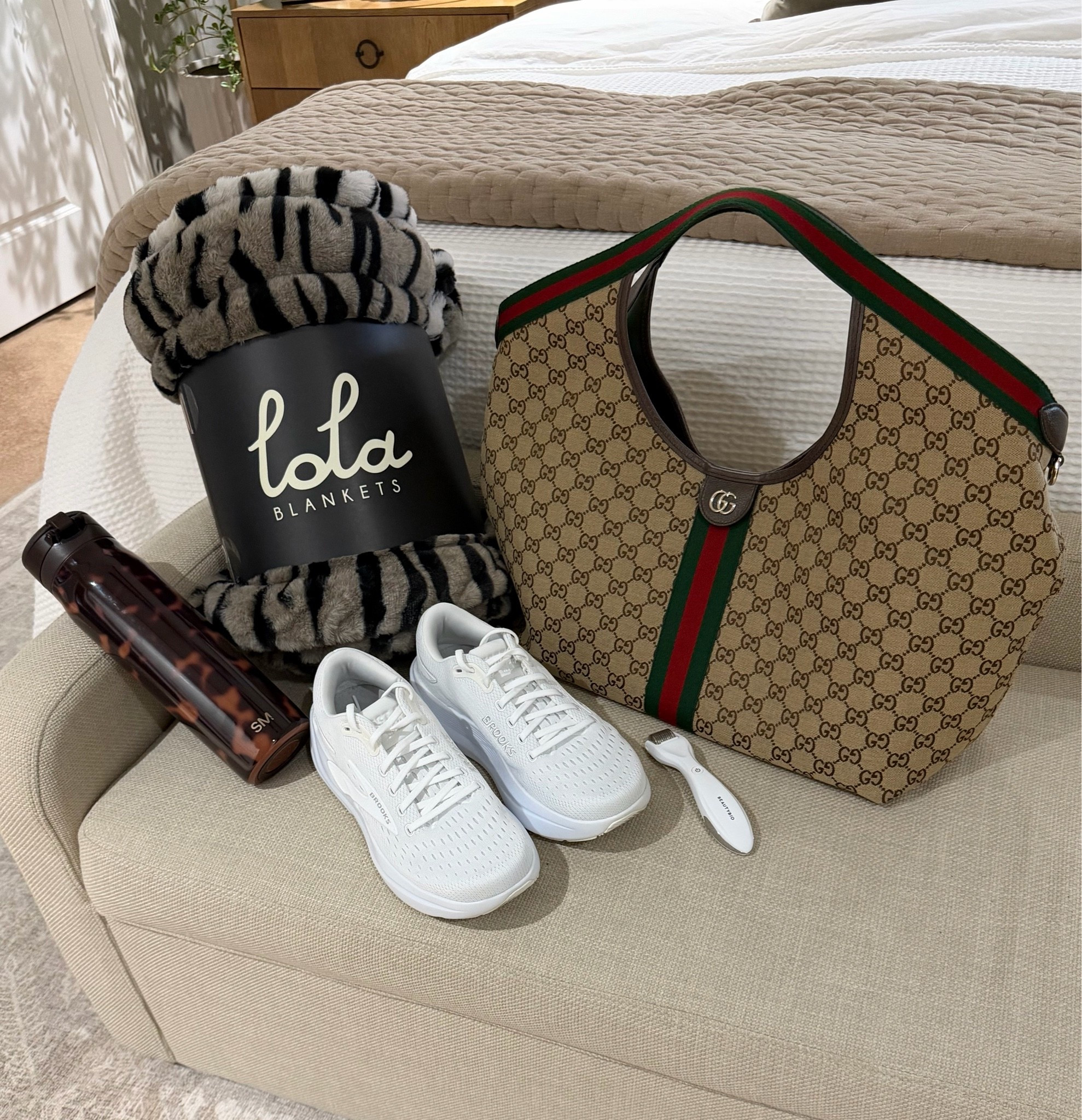 5 of my favorites! Gucci Giglio Tote, Lola Blanket, Brooks Ghost Max 3, SM Tortoise Mesa Loop tumbler, BeautyBio Microneedling tool

#LTKdayinmylife #LTKmorningroutine #LTKSaleAlert