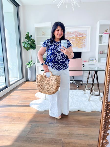 This top that so many of you loved is back in stock in most sizes in blue and fully stocked in white! Anthropologie top size XL. J. Crew white denim wide leg trousers size 32 Petite. Marc Fisher raffia wedge sandals, Target style straw tote bag. Kendra Scott hoop earrings and bracelet. 

Spring outfit, summer outfit, jeans, white jeans, wide leg jeans, sandals, business casual outfit, work wear, workwear, work outfit, travel outfit, spring outfits, spring outfit idea, spring outfit inspiration, everyday outfits spring, casual everyday outfit, Anthropologie top, wedge sandals, raffia sandals, straw tote bag, date night outfit, 4th of July outfit, July 4th outfit, Fourth of July outfit, July fourth outfit

#LTKOver40 #LTKWorkwear #LTKMidsize