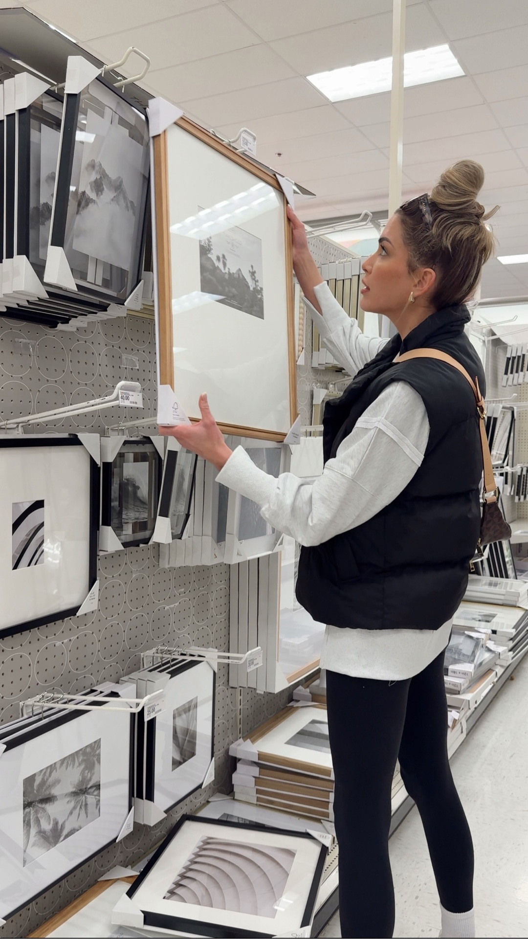 Frames frames frames! I hear yall! 

Highlights:

1. When styling frames, think about them from every angle. If someone can walk around the furniture, the back of the frame shouldn’t be on display. The exception is an accent table beside or between seating—just layer it in front of something taller like a lamp or a vase to conceal the back.

2. The photos inside the frame matter just as much as the frame itself. A pop of neon orange in a room full of soft neutrals will stand out the same way an off-tone gold does—balance is everything.

3. And when it comes to gallery walls, less really is more. Instead of 15 small frames climbing a staircase, opt for 3–4 oversized pieces. Bigger reads cleaner, calmer, and far more intentional.

•
•
Photo wall, black and white photo frames, entryway decor, living room styling, target home

#LTKHome