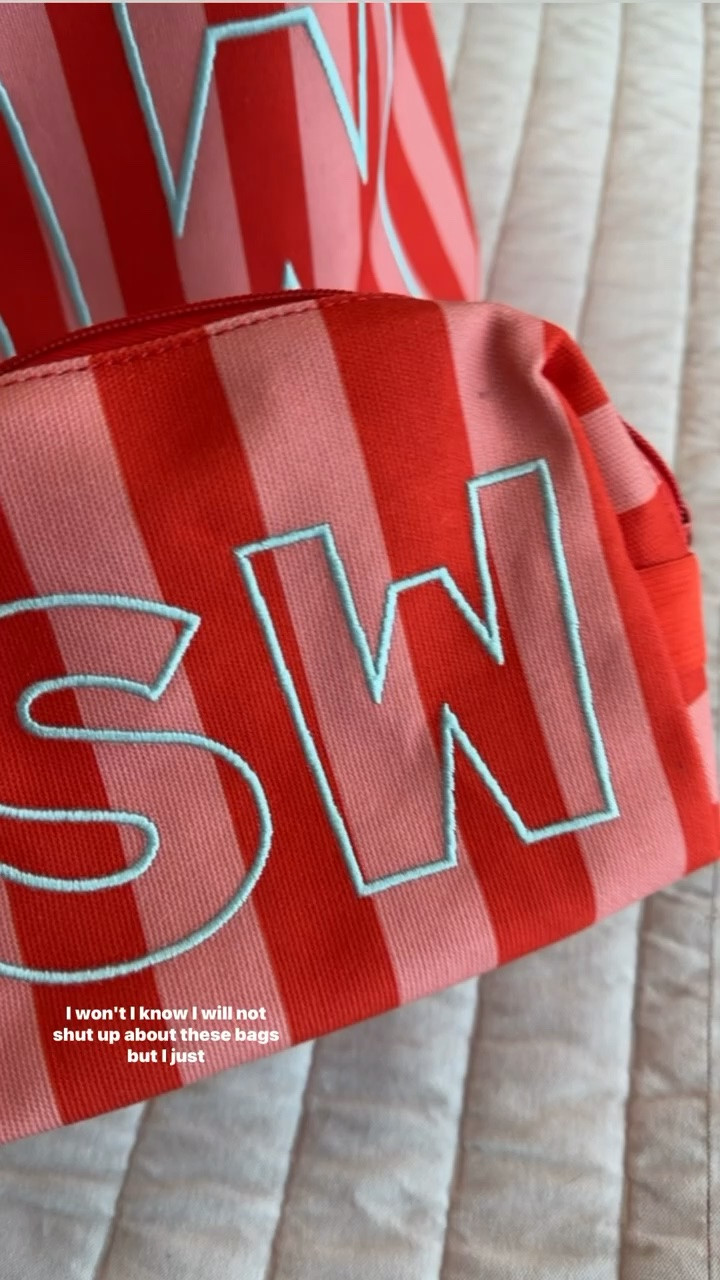 This everyday tote and matching pouch are such a fun way to keep your essentials organized while looking polished. I love using the larger bag for errands or travel, and the smaller pouch for cosmetics or small accessories—it makes staying stylish effortless.

everyday tote, matching pouch, travel bag, organized essentials, summer bag, red striped tote, casual chic bag, mom style accessory, versatile handbag, TheMomInStyle

#LTKTravel #LTKSeasonal #LTKmomlife