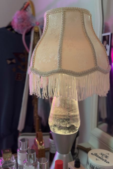 vintage lava lamp; added a lamp shade on top :)
My lamp is vintage, linking similar things 