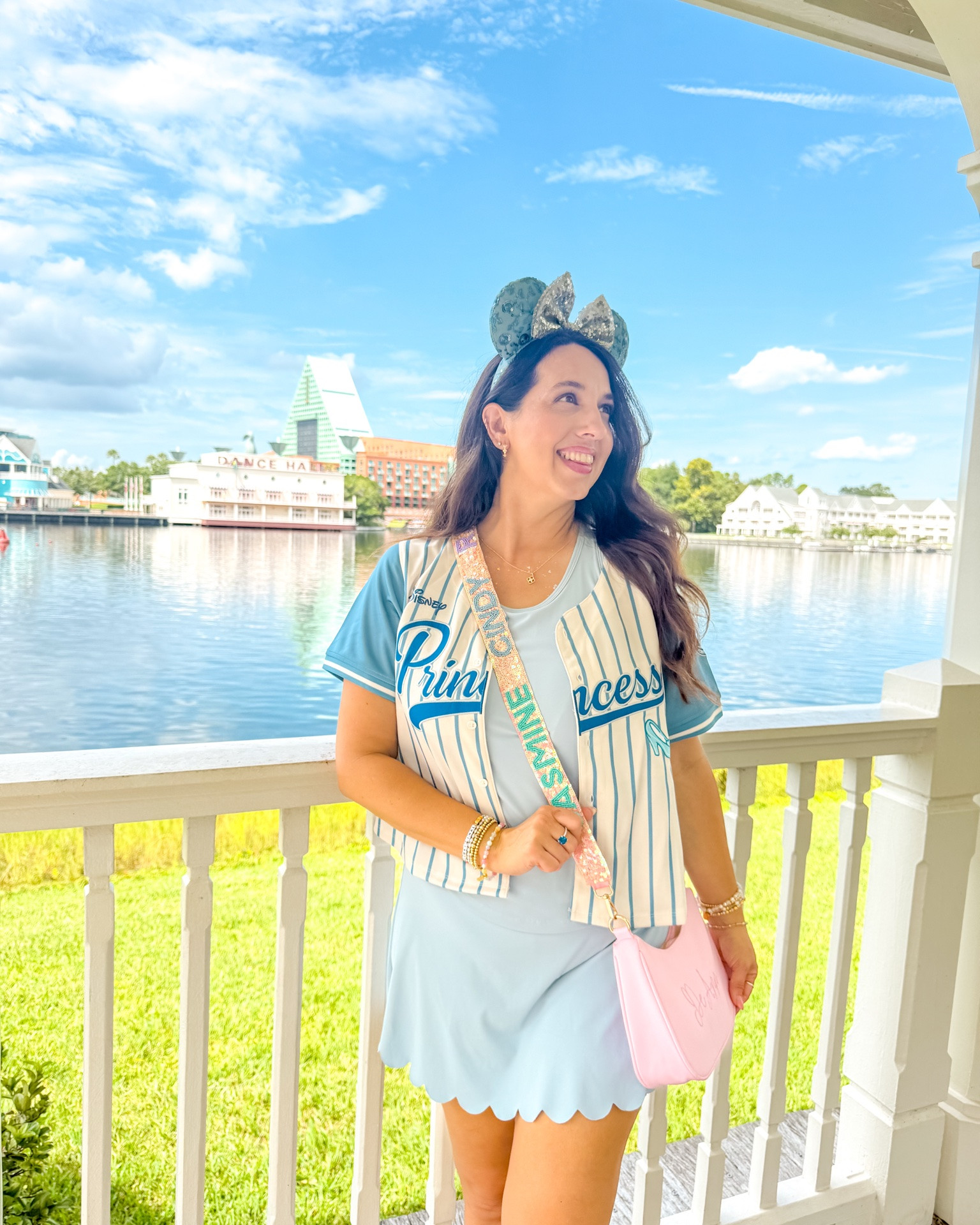 Where there is kindness, there is goodness.” 💙✨
Cinderella for Princess Week! 👑
👚 Jersey — BoxLunch
👗 Top & skirt set — Pinspark
👜 Bag + princess strap — Adored Luxe | code DEANN10
👟 Sandals — Crocs
👑 Ears — Pineapples & Aloha
💖 Bracelets — BaubleBar & Little Words Project

#LTKootd #LTKOver40 #LTKTravel