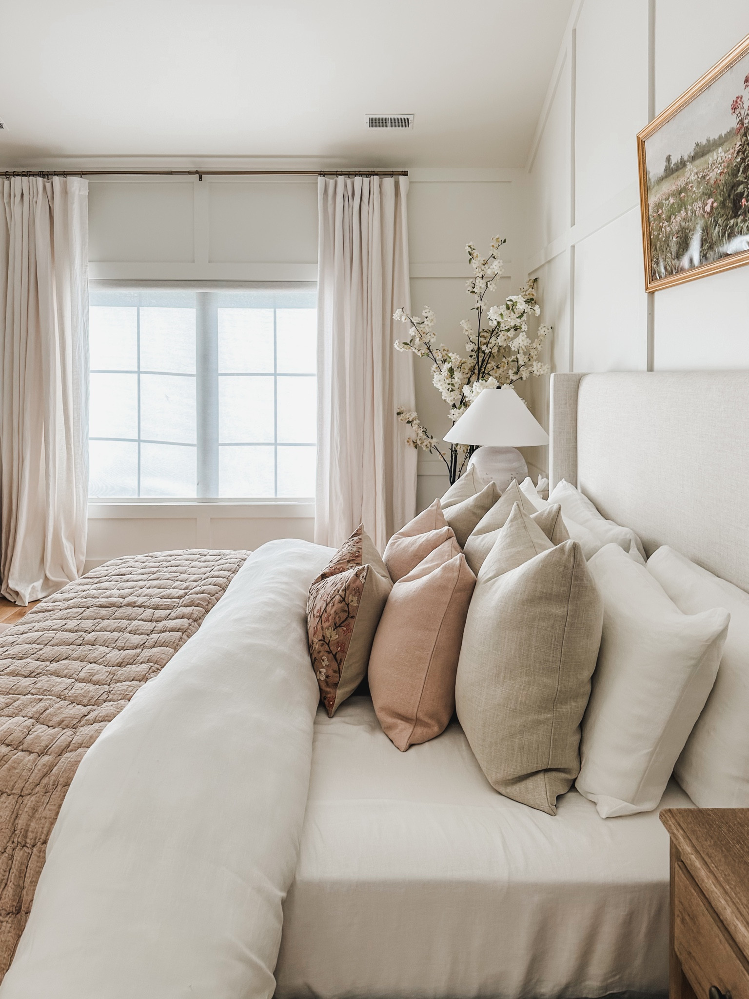 Cozy Pottery Barn bedding featuring neutral linen duvet cover, throw pillows, and pops of pink. Recently purchased a faux cherry tree and it is so stunning in person!

Bedroom refresh, cozy bedding, throw pillow, Pottery Barn style, light and bright, canvas art, furniture favorites, nightstand, finds lamp favorites, faux, cherry tree, marble tray, cozy bedding, throw blanket, aesthetic home, neutral style, Wayfair, faux cherry tree, upholstered bed, linen curtains, shop the look!

#LTKSeasonal #LTKStyleTip #LTKHome