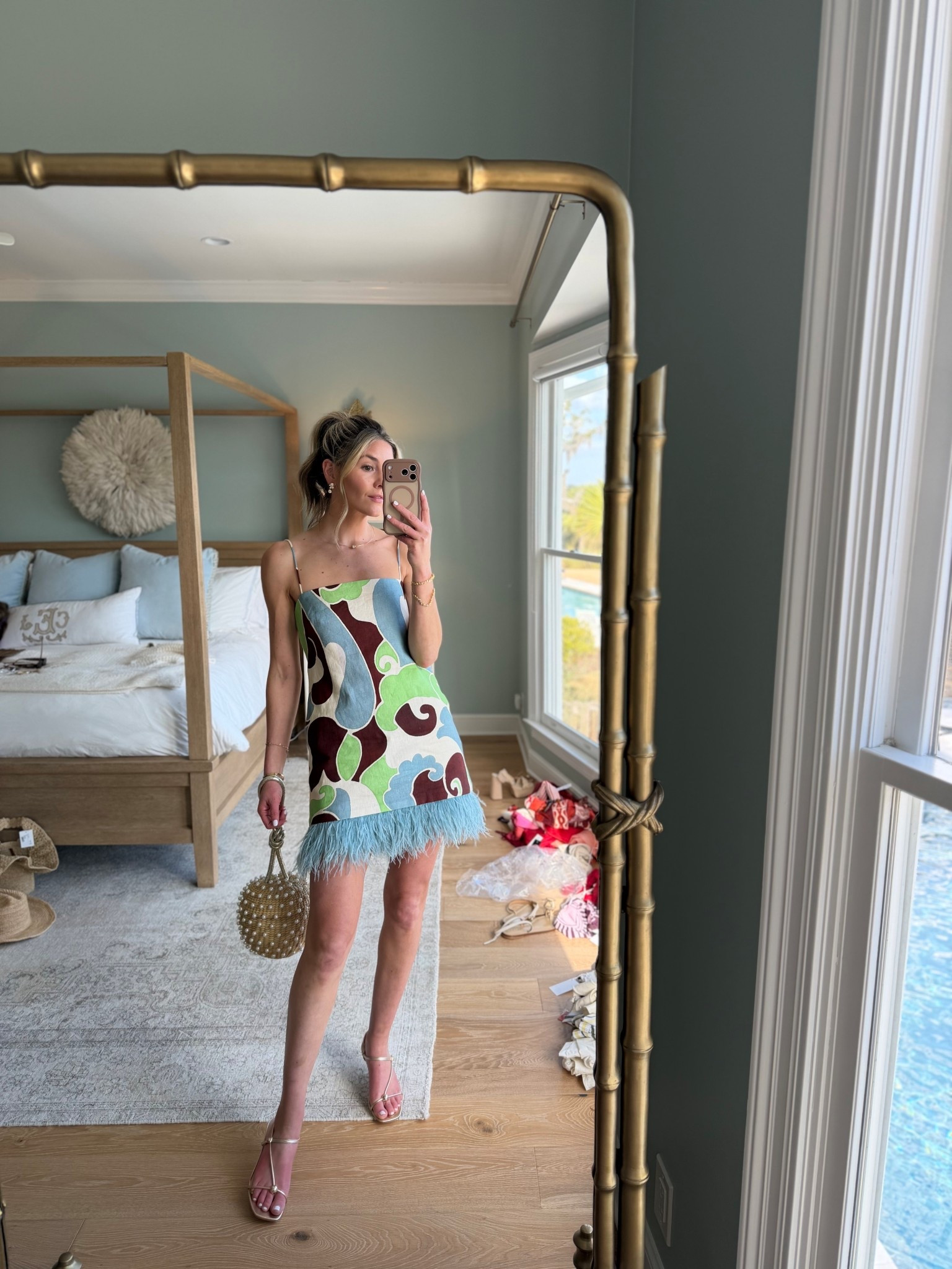 this feather trim mini dress is so fun!! bought this for dinner and drinks in st barths but it’ll be in rotation all summer. this disco bag is also a longtime favorite of mine, so fun and unexpected and fits all of the essentials.

#LTKootd #LTKSeasonal