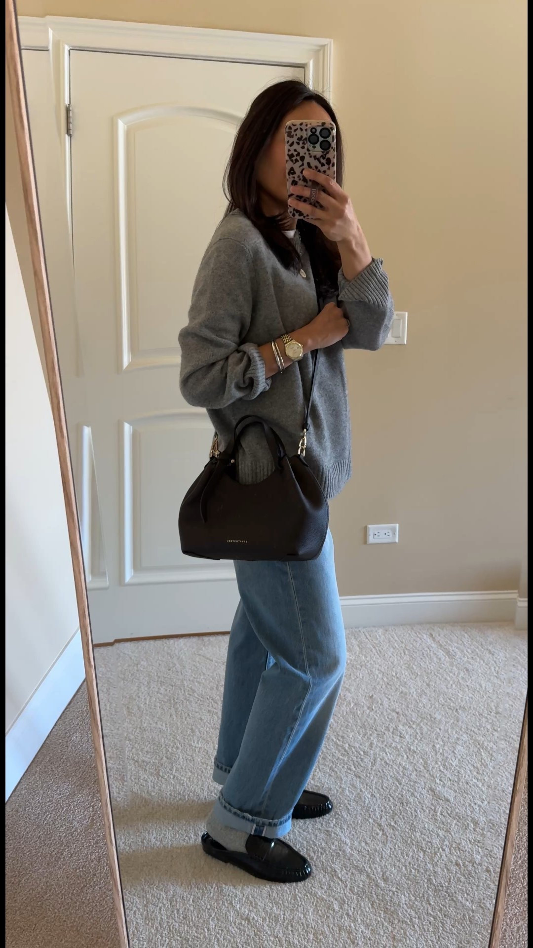 What I Would Wear if I Wasn’t Hibernating. 
- old & new favorites
- jeans: an all-time favorite straight leg style. This new wash is so good and done in the best denim material that Levi’s makes. If you love true 100% cotton denim, you will love this material. I size up in this style. 
- t-shirt: a favorite for the last couple of years. These 100% cotton tees last, hold their shape, and feel good on. This exact style is my favorite for layering. I wear true to size as a base layer and also a size up as a stand alone tee. 
- sweater: my favorite addition to my winter wardrobe this season. Timeless style. Casual chic. I have true to size in this staple gray. I may prefer the size up, but can wear both sizes. 
- loafers: love the modern classic style of these loafer mules that look designer. True to size. 
- bag: a souvenir from London. A versatile elevated everyday style. 
- necklace: new vintage charm on an old chain. It’s so pretty. 
- bracelets: my most worn style that really goes with everything  


#LTKOver40 #LTKootd