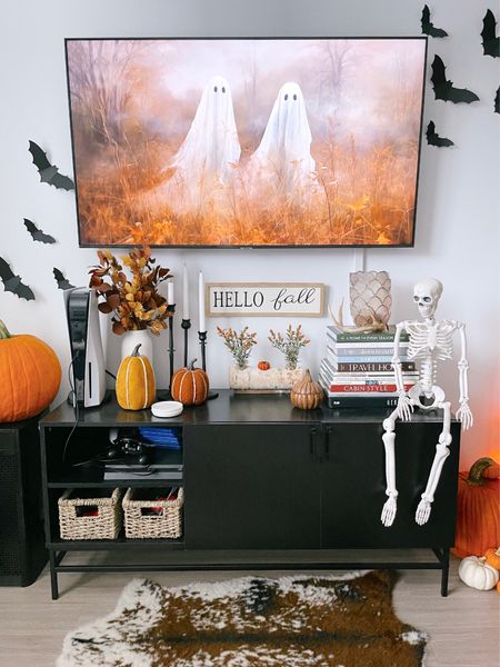 Our Halloween home decor! Ready for spooky season. Linked all of our living room furniture and decor for the holiday. 🎃👻💀🍁

Ps: our tv console is on sale & under $100!!!! 

#halloween #halloweendecor #livingroomdecor #livingroom #halloweenstyle 

#LTKSeasonal #LTKHalloween #LTKhome