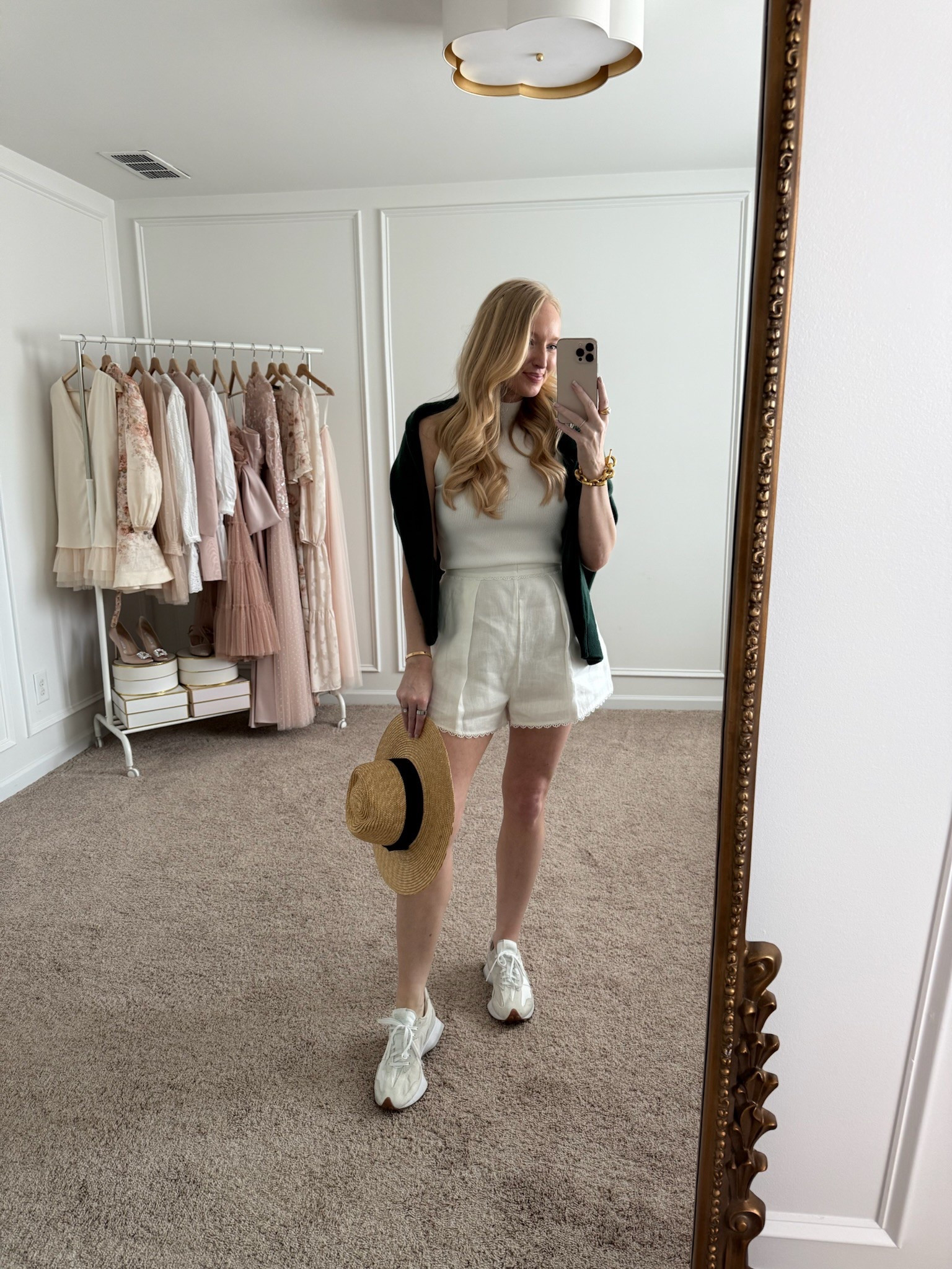 Casual monochromatic Masters outfit idea! I paired a white top with white linen shorts and white sneakers. And threw a sweater over my shoulders. Spring outfits // Masters outfits // day time outfits // casual outfits // monochromatic outfits 

#LTKStyleTip #LTKSeasonal