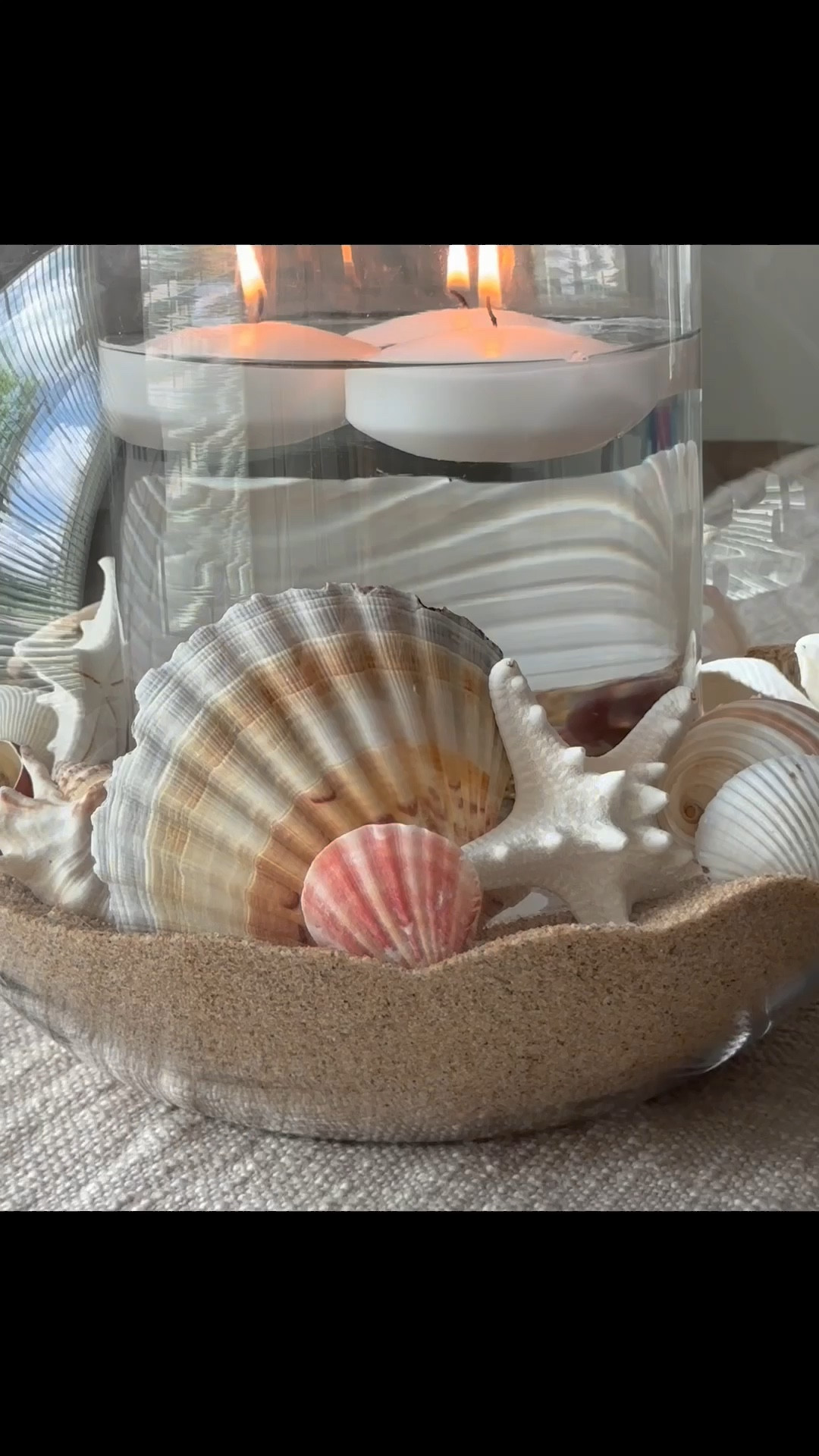 Beachy candlelight vibes… and so easy to make! This is so pretty for a Summer tablescape or side table  🐚🕯️

#LTKHome #LTKSummerEdit