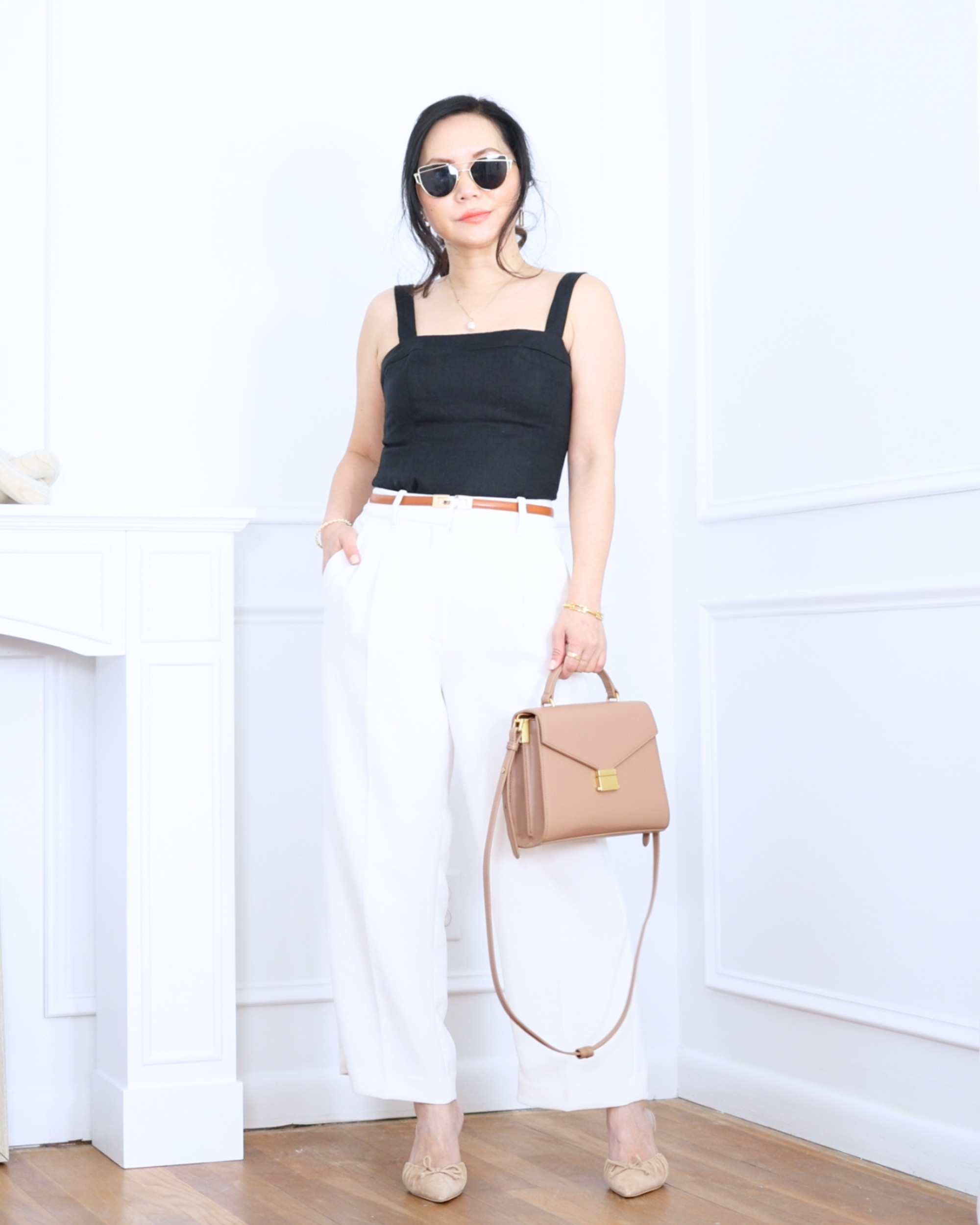 Linen fitted tank from Quince paired with white pants from Aritzia — clean, minimal, and effortlessly polished for warm everyday wear. I'm 5'2, wearing size S. 

 #LTKootd #LTKOver40 #LTKPetite