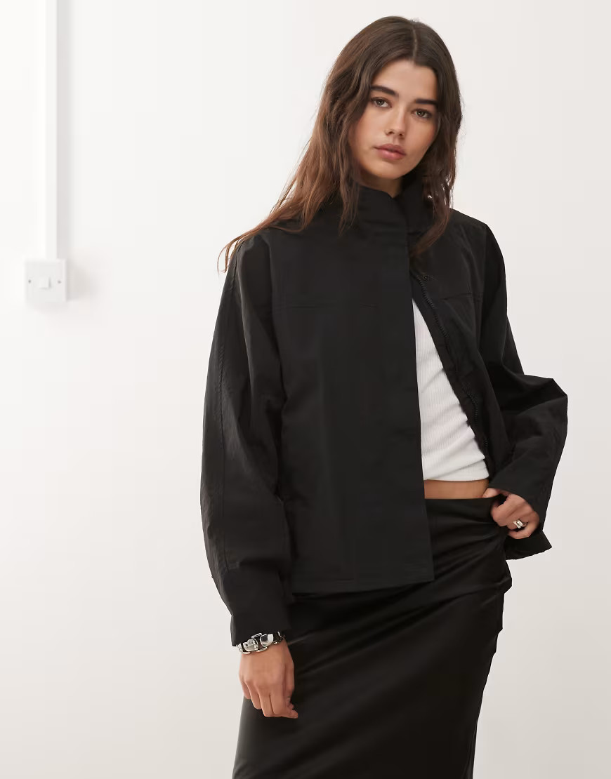Lioness Shoreline cotton high neck adjustable hem windbreaker jacket in black | ASOS (Global)