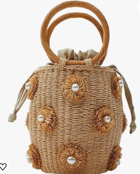 Straw bucket bag with pearl detail and circle handle. Lightweight. Comes with thin scarf. Under $40.

#LTKSeasonal #LTKitbag #LTKfindsunder50