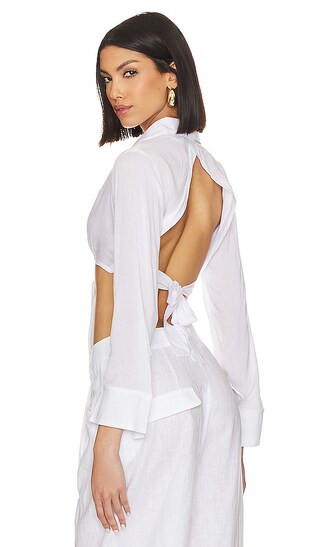 x Jetset Christina Noemi Cropped Beach Shirt in White | Revolve Clothing (Global)
