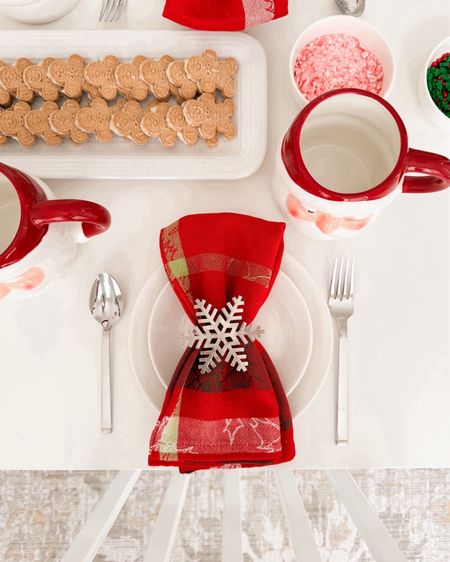 Holiday table set up! 

Snowflake napkin ring, dinnerware set, Santa claus mug, serving platter tray, napkin set. 