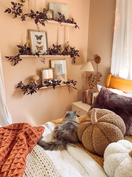 Cozy fall shelves with Afloral leaf garlands and pottery barn pumpkin pillows #afloral #falldecor #autumndecor #fall #amazonfinds

#LTKSeasonal #LTKhome