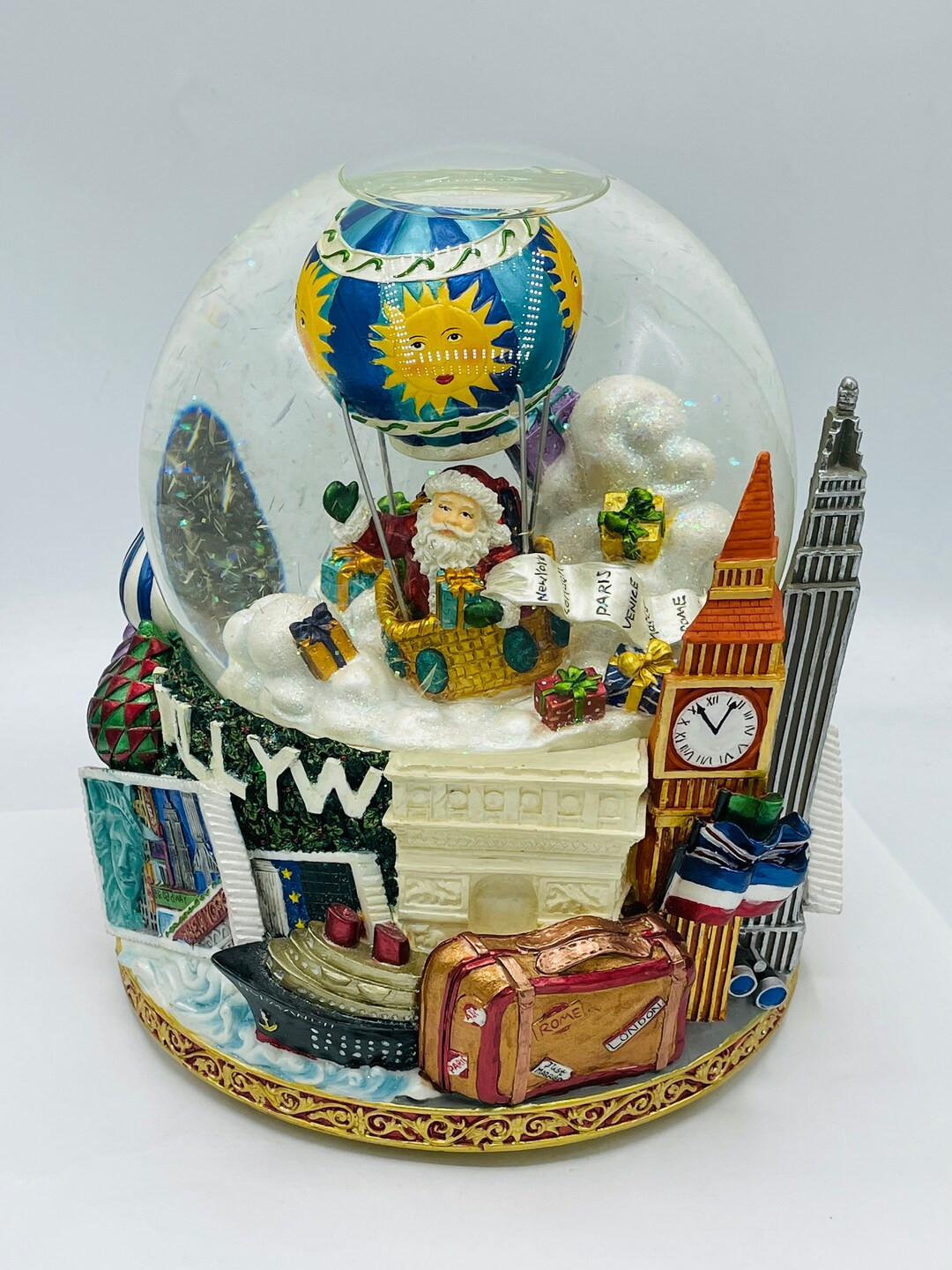 Musical Snow Globe Featuring Santa In a Hot Air Balloon Traveling the globe | Etsy (US)