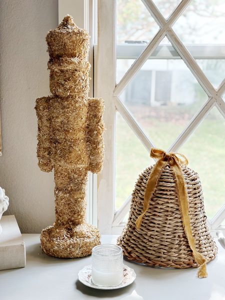 I bought this large flocked nutcracker and covered it with dried hydrangeas petals and love how it turned out.

It made the perfect neutral color nutcracker to go along with my wooden nutcracker collection. 

And these large woven bells are pretty amazing too! 

#holidaydecor #nutcracker #christmasdecor

#LTKSeasonal #LTKHoliday #LTKhome