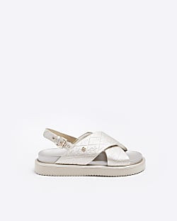 Gold RI monogram cross strap sandals | River Island (US)