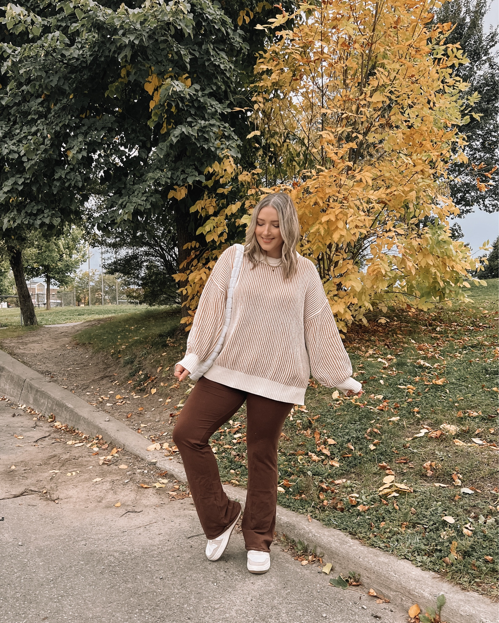 Comfy fall outfit - wearing L in oversized sweater (linked this year’s version), brown flare leggings are part of a matching set from Amazon, also wearing L. My quilted bag is also an Amazon find! My sneakers are affordable and super comfy, fit TTS


#LTKstyletip #LTKautumn #LTKmidsize