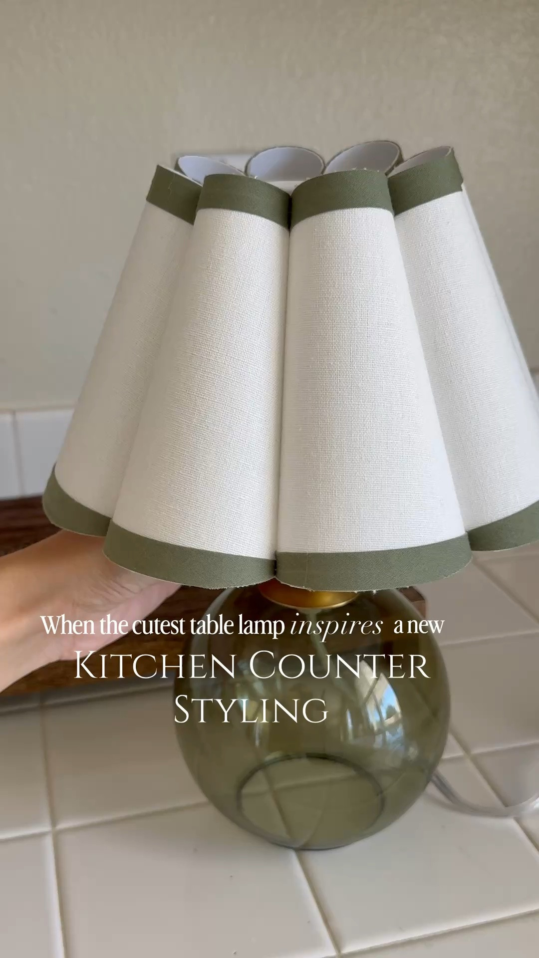 Laid my eyes on the cutest table lamp while waiting in line for checkout @homegoods (I guess we all make a great deal of our purchases there 😂)  This inspired a new kitchen counter styling and I couldn't be more obsessed!

Take this as your reminder that your outdated kitchen deserves some love and warmth 💚🤎

🔗 I’ve linked similar items, let me know if you'd like to send it your way.

Kitchen Counter, Kitchen Counter Decor, Kitchen Counter Styling, Kitchen Vignette, Simple Styling
#kitchendecor #counterstyling #homeswithpurpose #livedinhome #kitchenstyling

Mini table lamp, green lamp, wooden riser, mango wood, salt and pepper electric mills, oil dispensers, space saving , amazon find, rechargeable light bulbs