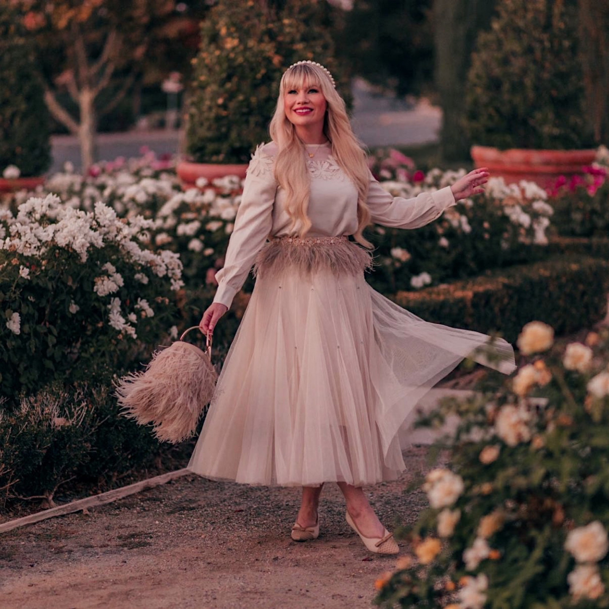 Gorgeous cream neutral monochrome outfit for fall. Gorgeous holiday outfit with feather bag! Chicwish tulle skirt #chicwish #feathers #holiday #holidayoutfit #falloutfit 

#LTKsalealert #LTKstyletip #LTKunder100