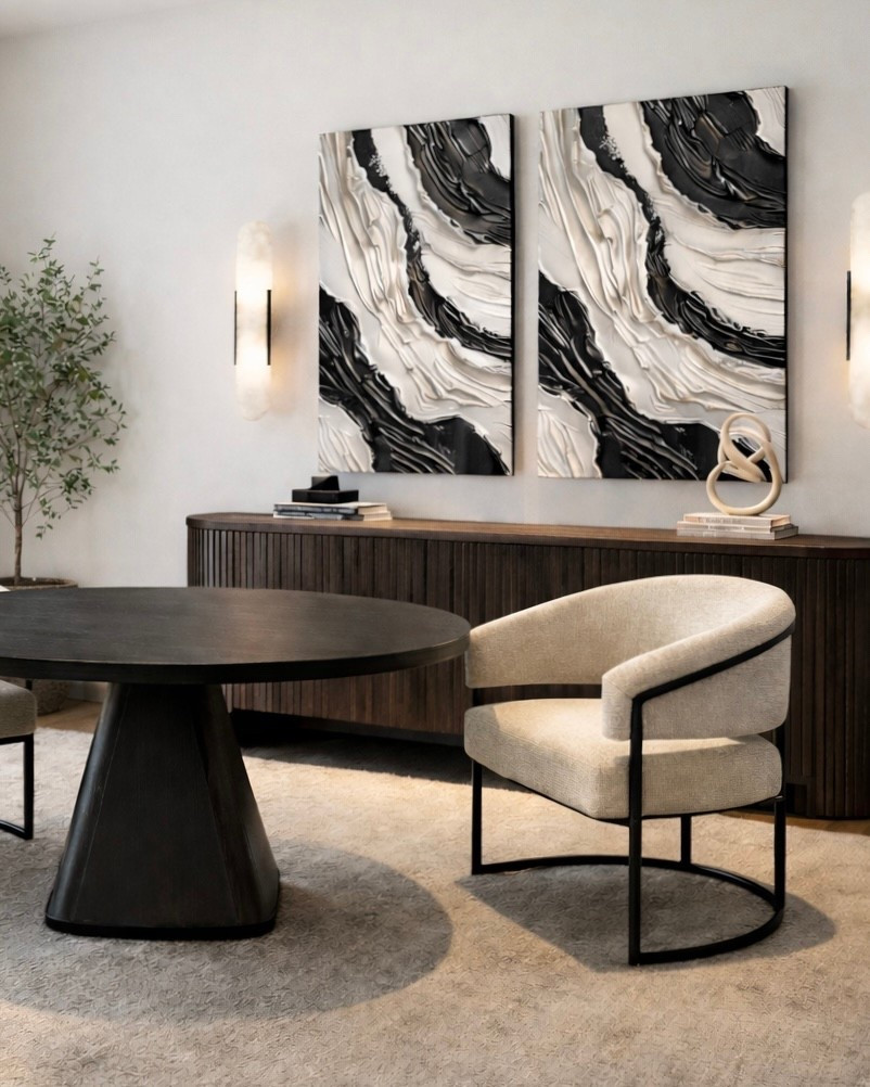 Moody contrast done right 🖤 This black pedestal dining table paired with soft cream boucle chairs creates the perfect balance of bold + cozy. The fluted console, marble-inspired abstract art, and modern sconces tie it all together for a high-end, designer look for less!

#LTKSaleAlert #LTKSpringSale #LTKHome