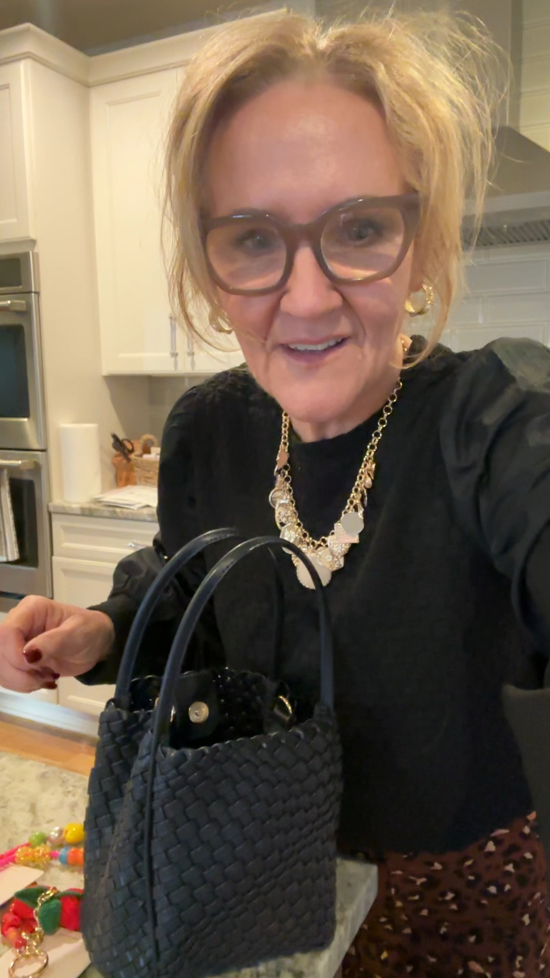 Bag charms and Anthropologie vegan bags! 

This is such a cute fun trend and the make the best gifts! Grab a few! 

My necklace is a statement and so pretty. 

Top size med 
Colette leopard print ponte knit pants 

Anthropologie gifts for her vegan bags 

#LTKItBag #LTKGiftGuide #LTKFindsUnder100