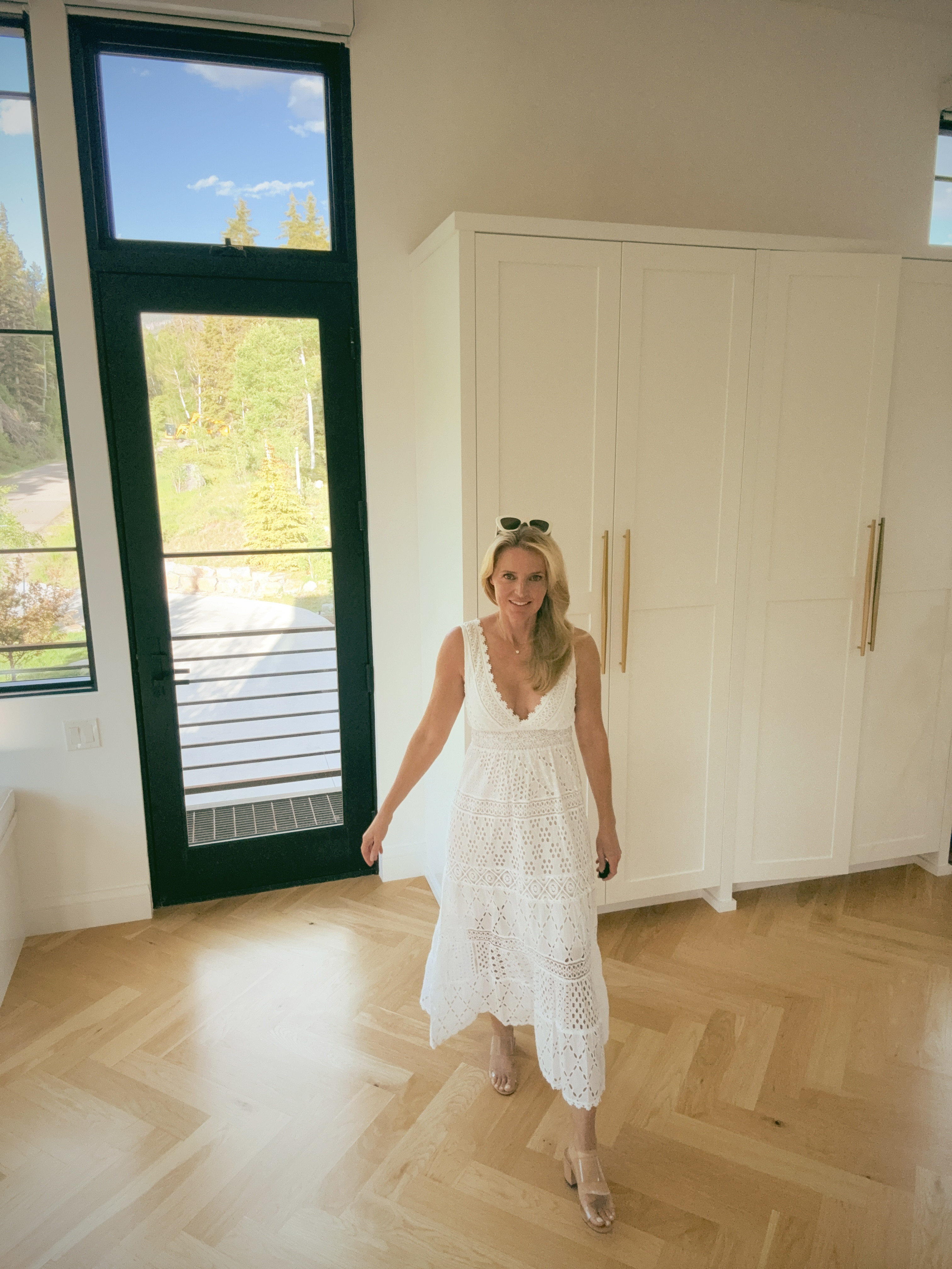 White eyelet is having a major moment and this Temptation Positano midi dress is exactly why. 

The scalloped hem, deep V neckline, and tiered cotton eyelet construction give it texture and movement that photographs beautifully. A true vacation dress that works just as well for a summer dinner at home.

#LTKootd #LTKgrwm #LTKOver40