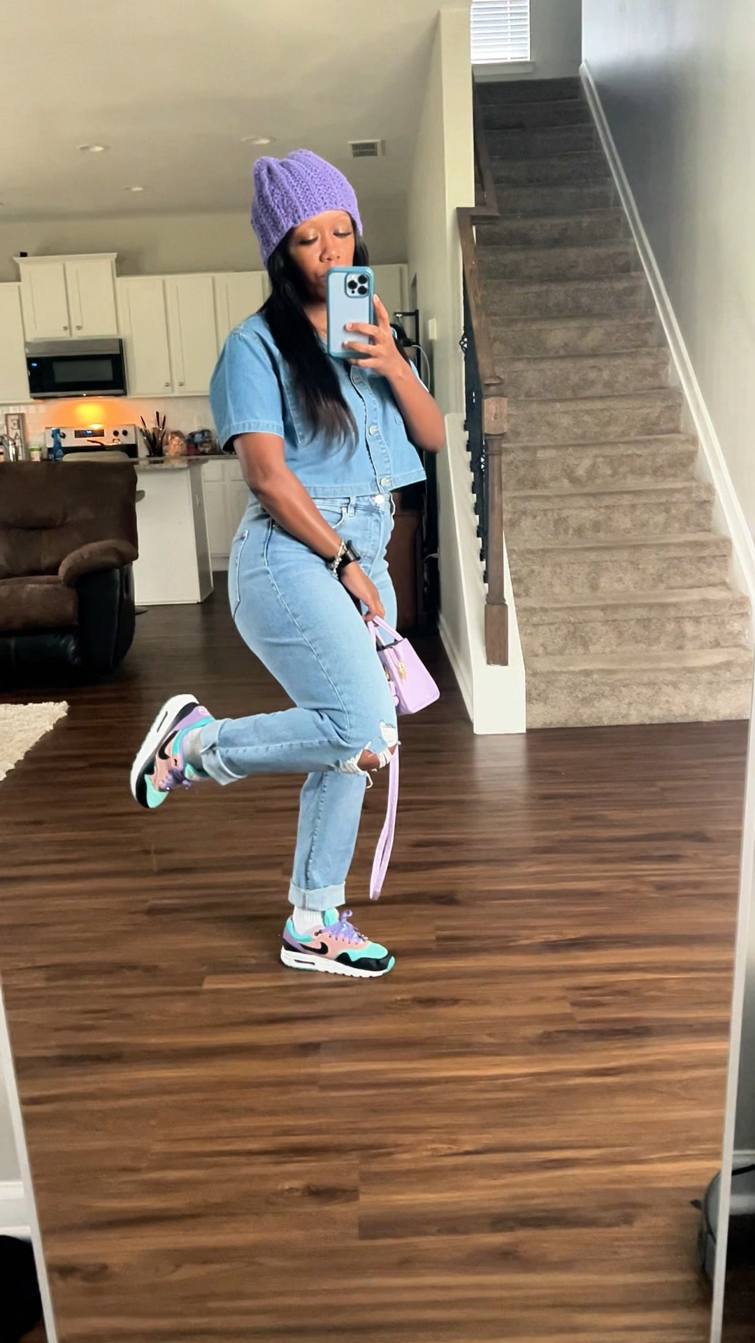 Casual outfit idea. I’m wearing a cropped denim button up shirt with high waisted distressed mom jeans. I styled this outfit with a purple beanie, purple crossbody bag, and Nike air max 1 sneakers

#LTKStyleTip #LTKPetite #LTKFindsUnder100