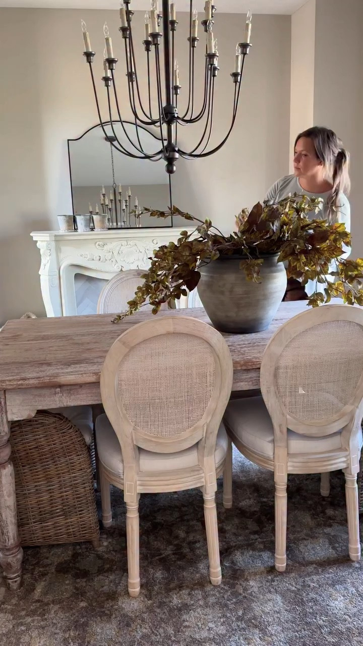 Stunning timeless finds from my friends @antiquefarmhouse 🤍 This chandelier, vase and scalloped planters have been the perfect addition to our dining space 🍂🍁Trying to soak up all the fab vibes! 

My event “Modern Rustic Warm” is live on the Antique Farm House site. SHOP for details

#cozyhome #fallaesthetic #cozyvibes #myafh #antiquefarmhouse #cozyhomedecor #falldecor