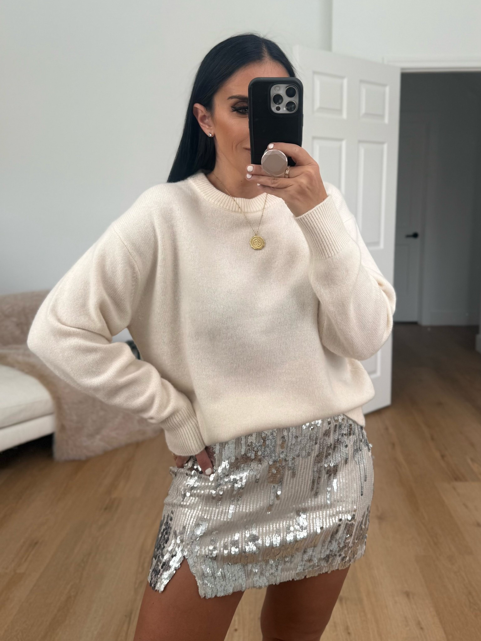 Madden NYC Women's Sequin Mini Skirt wearing size small. Cashmere crewneck sweater.