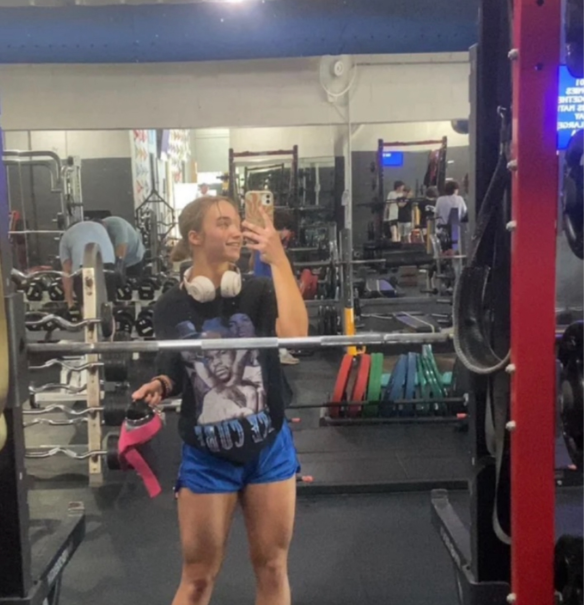 Cute little royal blue gym outfit with blue shorts and an ice cube shirt complete with the headphones and pink lift straps 

#LTKActive #LTKFindsUnder50 #LTKFitness