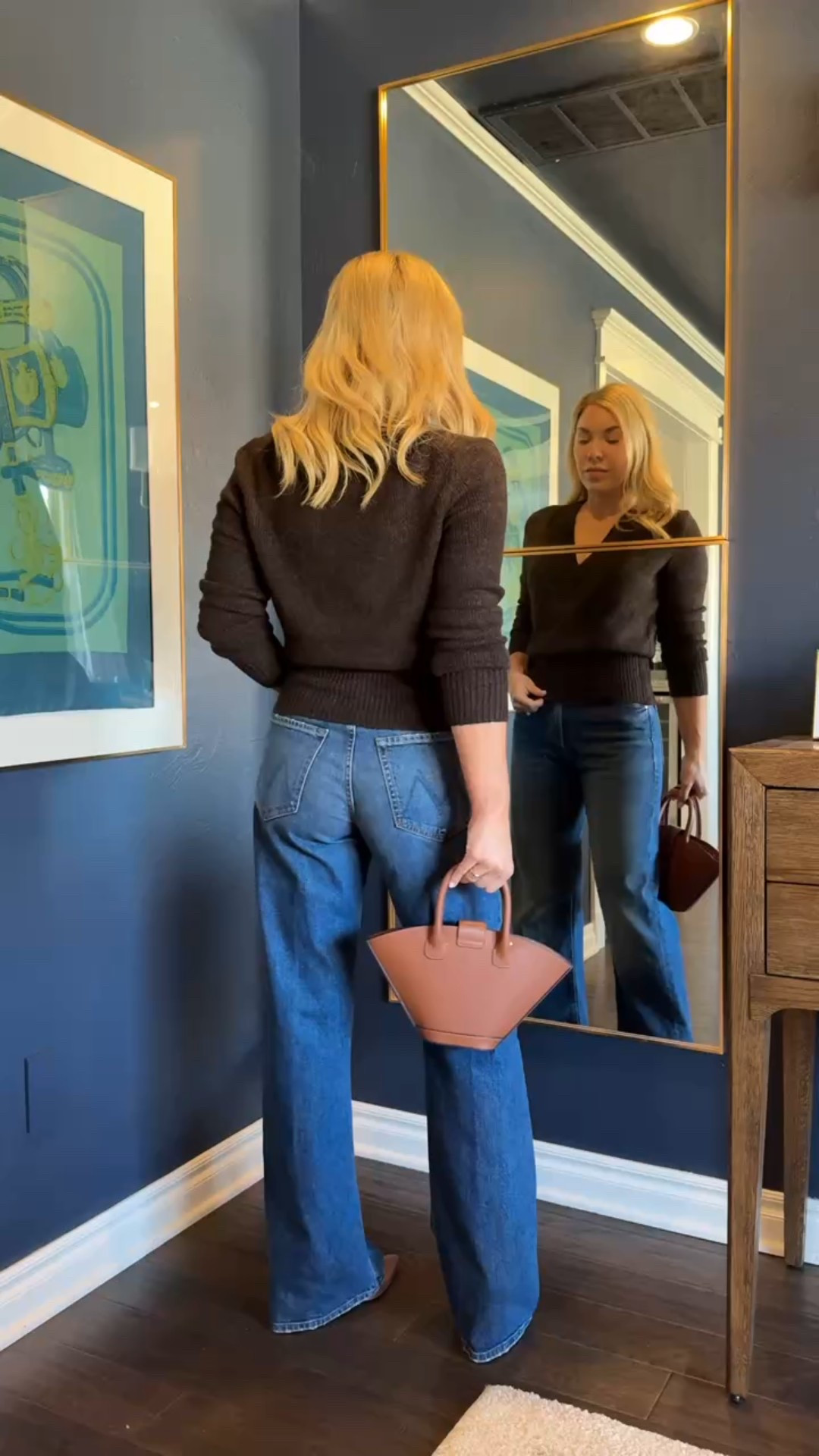 These are a cross between a barrel and wide leg jeans - as far as length I am 5’4 with long legs.

Mother jeans 
Wrap sweater 
Sweater
#ltkshoecrush
#ltkitbag

#LTKStyleTip #LTKFindsUnder100 #LTKSeasonal