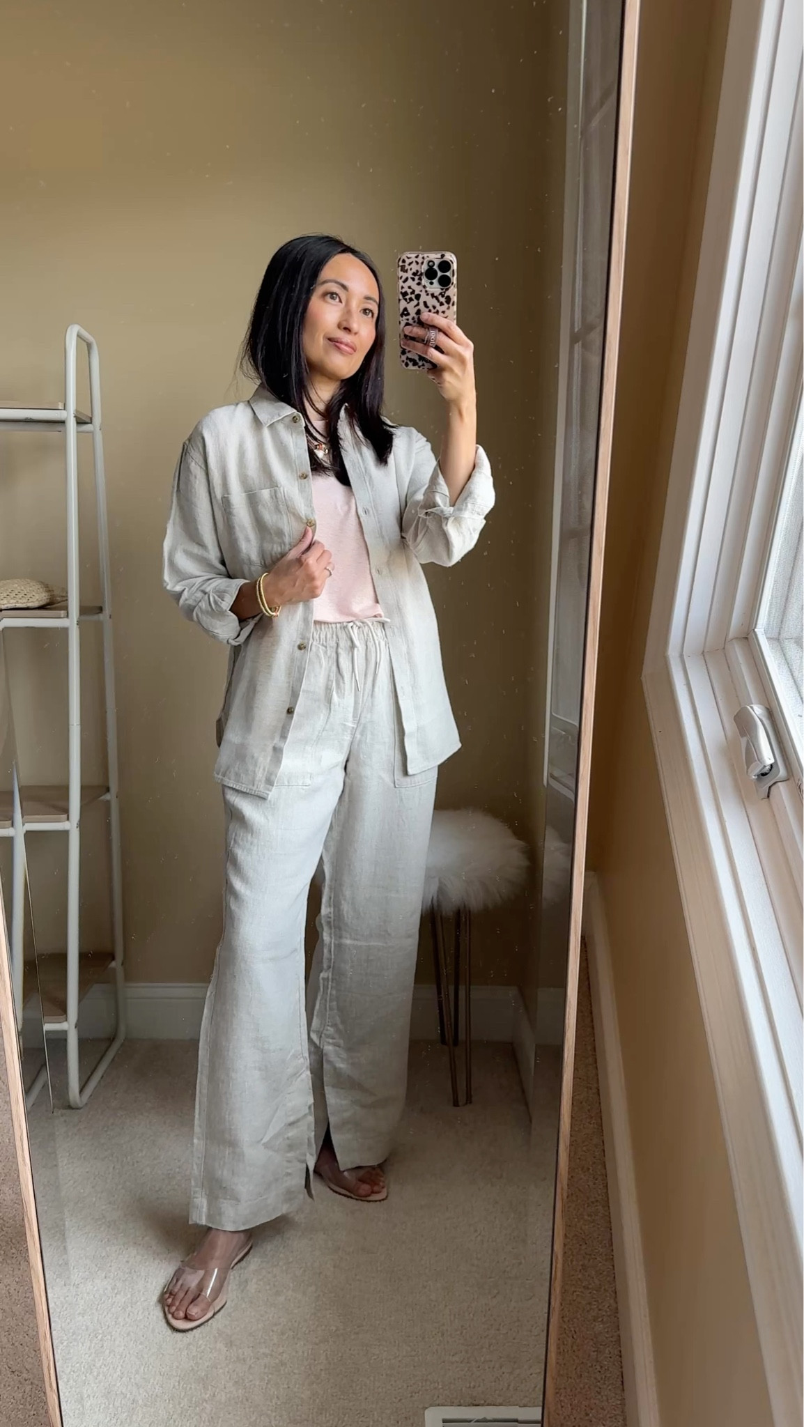 My most worn linen pants are on sale for $57. I love the wide leg cut, with the chic slit on the inner hem. Comfy adjustable elastic waistband, zip front pockets and back pockets. 
I size down and take the petite length in these pants at 5’4 yo wear with flat sandals. 
I have two colors from over the years. 
This color is called undyed. 
Clear stral sandals. 
Linen tank top is also an all-time favorite for last few years. True to size  
Vacation outfits. Summer outfits

#LTKTravel #LTKSaleAlert #LTKOver40