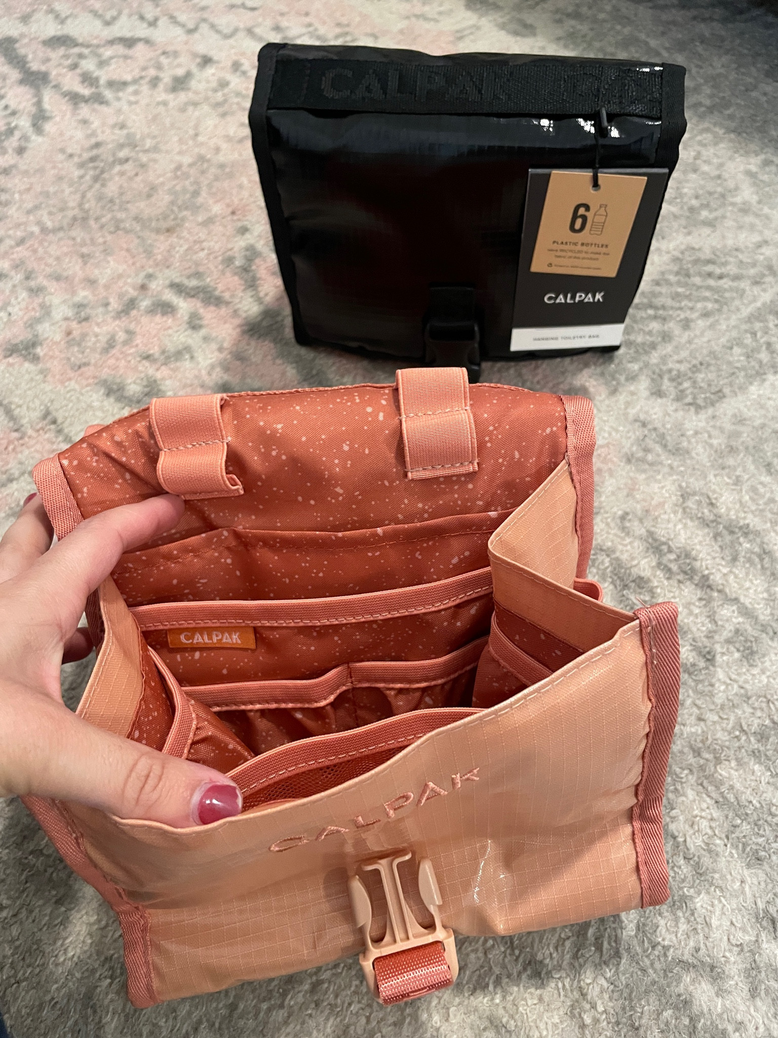 The Calpak Toileries bag is made from 6 plastic water bottles and has so many compartments to store all of you travel toiletries. This is the perfect size for you carry-on luggage!

#LTKGiftGuide #LTKunder100 #LTKtravel