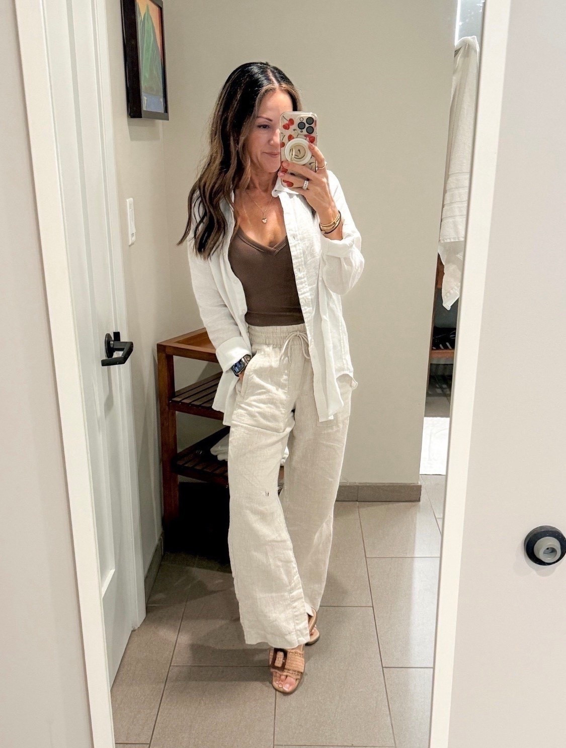 OOTD for a cooler Maui morning, this is one of my favorite easy travel looks. These linen pants are so comfortable and come in petite, regular, and tall which I love. The button down is perfect worn open or as a swim coverup, and the built in bra tank is such a good staple.

Size down in the pants, I’m wearing XXS petite. Wearing XS in tank. Slides TTS

maui outfit, linen pants outfit, vacation outfit ideas, travel day outfit, beach coverup outfit, petite friendly fashion, casual summer outfit, neutral outfit inspo, resort wear look, EverydayHolly

#LTKSeasonal #LTKootd #LTKTravel